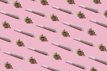 Cannabis bud and joint for smoking. Pattern on a pastel background