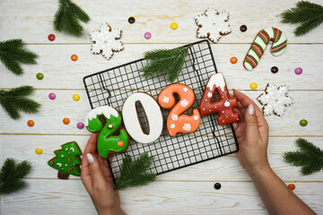 The numbers 2024 from gingerbread. New Year's background. Christmas dessert. 