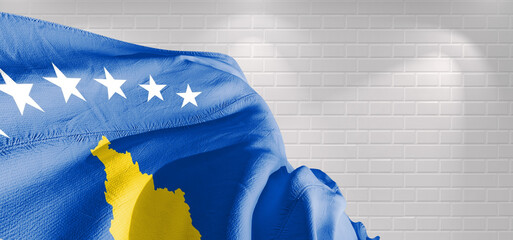 Kosovo national flag cloth fabric waving on beautiful light Background. - obrazy, fototapety, plakaty