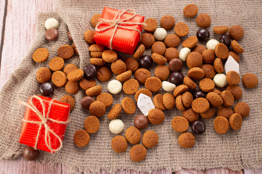 Dutch holiday Sinterklaas background with traditional sweets pepernoten for St. Nicholas Day