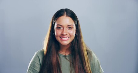 Face, smile and woman with air kiss in studio isolated on gray background mockup space. Portrait, blowing and hand gesture for love, romance emoji and care of flirting person on valentines day date