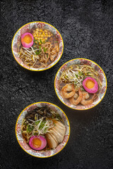 Ramen soup with egg and herbs. Close up