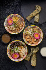 Ramen soup with egg and herbs. Close up
