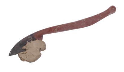 Grey modelling clay sculpture with modelling tool isolated on white, clipping path  