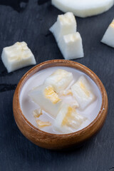creamy yogurt with melon flavor and chunks