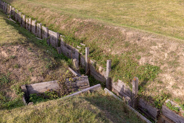 an old abandoned military trench used for defensive actions