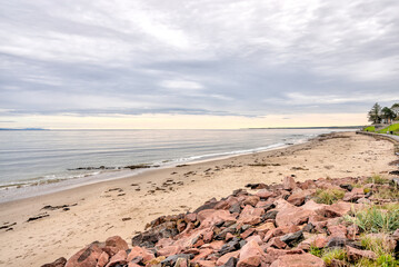 Nairn, Scotland - September 24, 2023: VIews along the water's edge at sunrise in the seaside town of Nairn, Scotland
