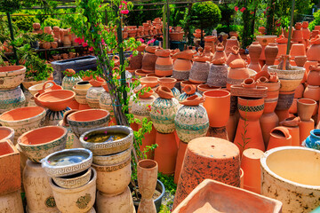 Clay products from pottery production. Background with selective focus and copy space