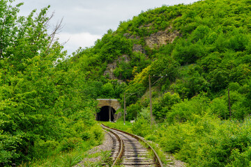 Fototapeta premium Railway tunnel. Background with selective focus and copy space