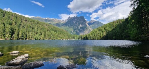  Nestled amid the picturesque landscapes of the Austrian Alps, Lake Piburg enchants with its...