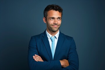 Thoughtful businessman looking at camera, smiling, one color background, generative ai