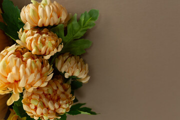 the chrysanthemum flowers. autumn bouquet. bouquet of yellow flowers. the flowers are Burgundy color. bouquet with apples