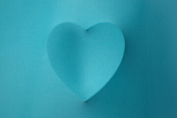 background texture heart under the fabric. basket for a newborn photo shoot. blue heart