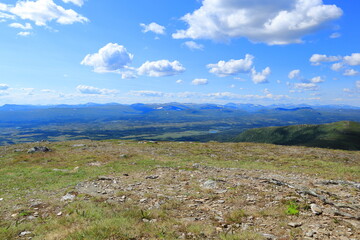 Fototapeta na wymiar Great view from Ansätten mountain. Summer day in July 2023. Jämtland, Sweden.