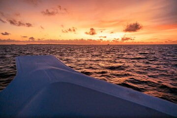 Scenic view of the sunset from a boat trip over the Indian Ocean in the Maldives
