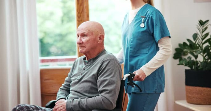 Old man, wheelchair and nurse in home window for retirement living, comfort or nature view. Senior male person, helper and health support in old age service or assistance, patient trust or connection
