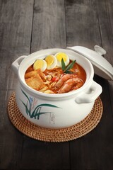 Curry Laksa which is a popular traditional spicy noodle or udon soup from the culture in Malaysia