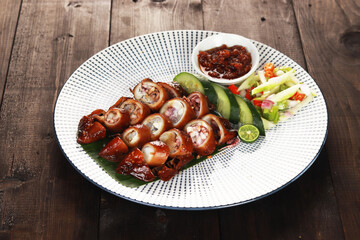 baked squids with chili called cumi bakar bumbu sambal or grill jumbo sotong