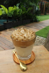 Dalgona coffee, Iced fluffy creamy whipped trend drink with coffee foam and milk
