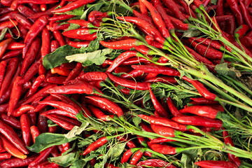 Ripe red hot chili peppers vegetable background.