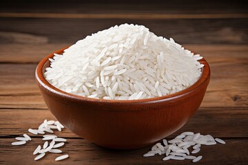 Basmati rice cooked in a terracotta bowl on a plain or wooden surface