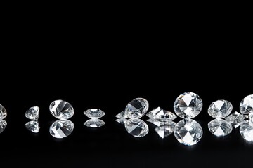 Expensive cut diamonds on white background with reflections on the ground ample blank space