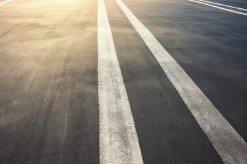 Aerial view of tire track mark on asphalt road, abstract background.