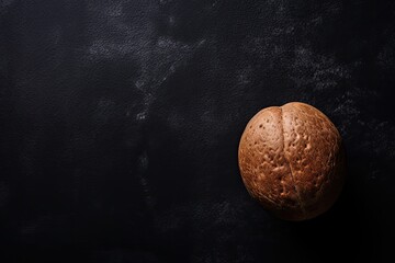 Nutmeg above dark background space for copy
