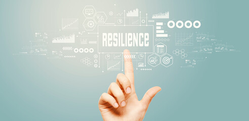 Resilience theme with hand pressing a button on a technology screen