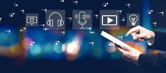 Podcast theme with businessman using a tablet computer at night
