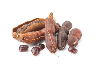 Tasty tamarinds and seeds on white background