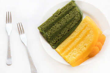 orange, green tea cake dessert snace delicious arrangement flat lay style on background white 