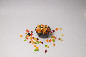 Mixed dry fruits on Black bowl with white background, Mixed dried fruits on glass bowl with white background
