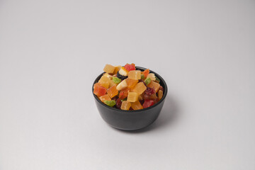 Mixed dry fruits on Black bowl with white background, Mixed dried fruits on glass bowl with white background