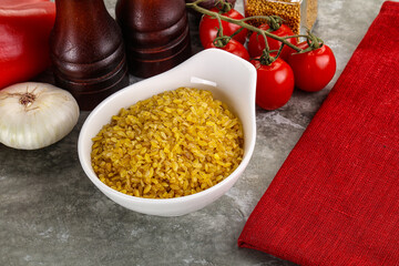 Dry wheat bulgur cereal heap