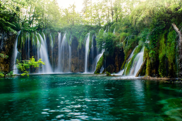 Fototapeta na wymiar A medium waterfall at the Plitvice lakes