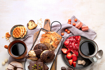 Cup of coffee with waffle, cookies, cake and dunut on light background. Hot drink and desserts