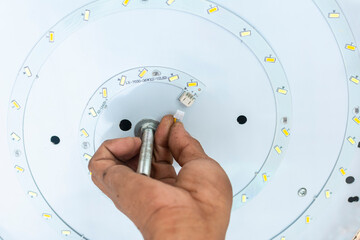 Connecting power source to the LED strip. Assembling a LED dome ceiling light.