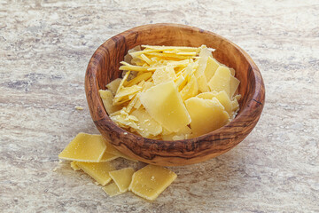 Sliced parmesan cheese heap in the bowl