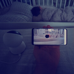 Monitoring from the phone through the camera for a child sleeping in the room
