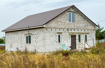 New two-story brick house outside the city