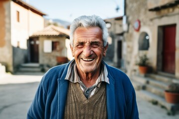 an old man smile at camera