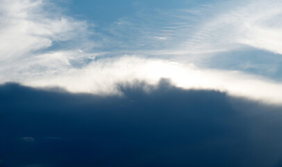 Naklejka na ściany i meble Gray cloud in the sky