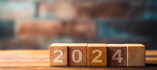 Fotobehang A stack of wooden blocks cube. 2024 new year concept, Copy space, Business 2024 concept, For art texture, presentation design or web design and web background. © toodlingstudio