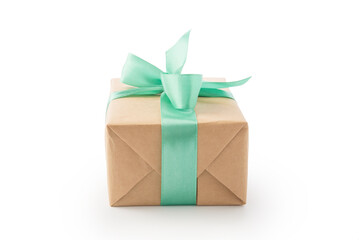 Brown paper gift box with green ribbon isolated on white