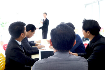 Businesspeople discussing at conference office desk, businesspeople listening to presentation, brainstorming at group board meeting, people reached agreement deal, successful company teamwork meeting.