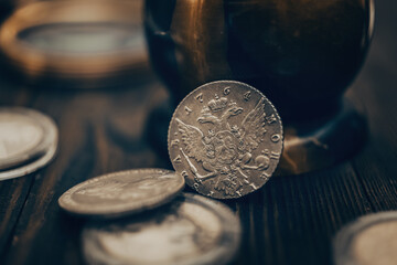 Numismatics. Old collectible coins on the table. - 677059909