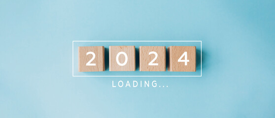 2024 New Year Loading bar with wooden blocks on blue background. Start new year 2024 with goal plan, goal concept, action plan, strategy, new year business vision. Header, banner, card, background