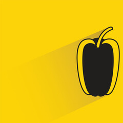 bell pepper with shadow on yellow background