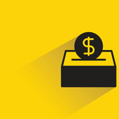 dollar saving box with shadow on yellow background